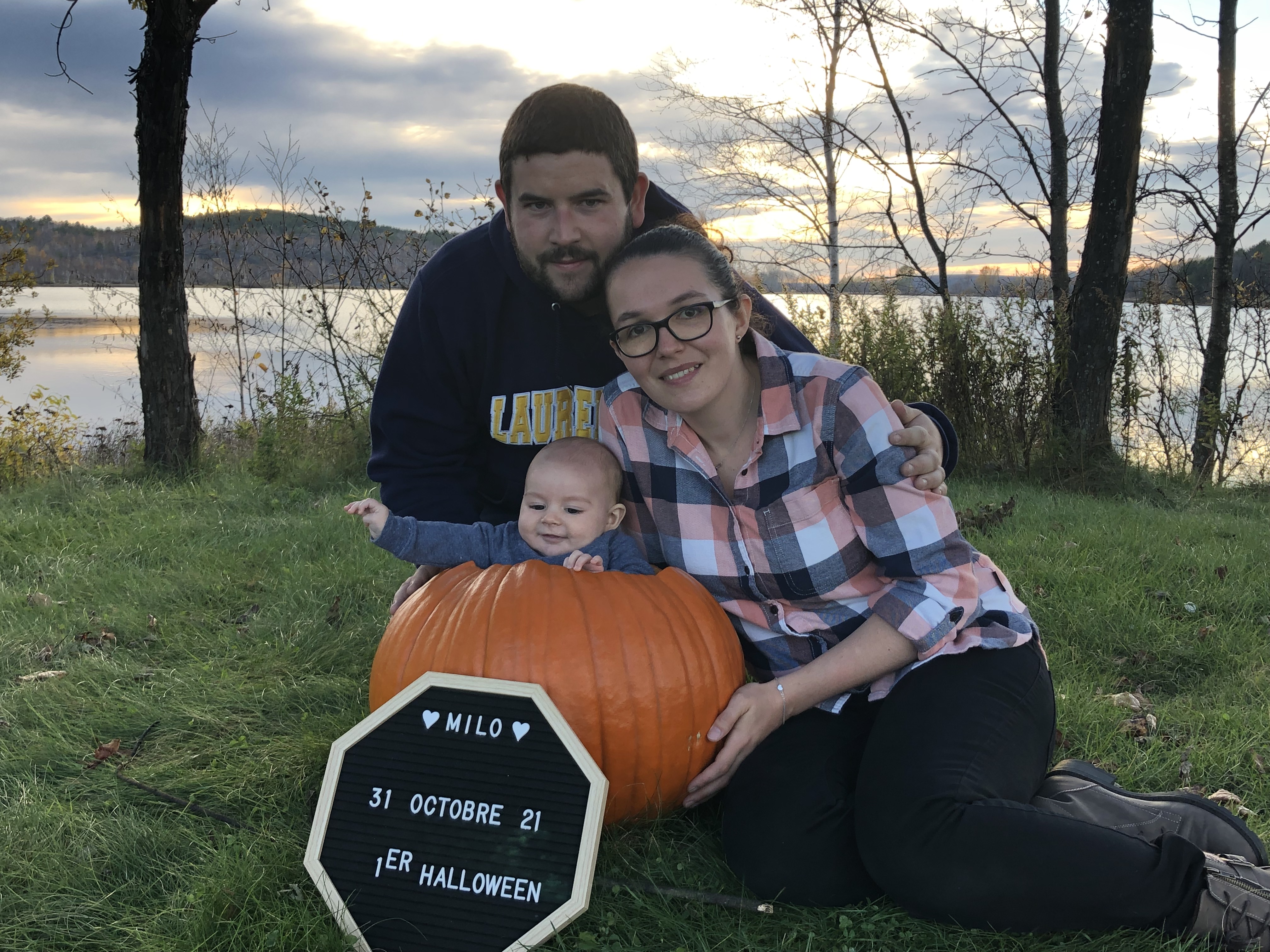 Gaetan Launay with his partner Marie and their son, Milo in 2021, with a pumpkin. 