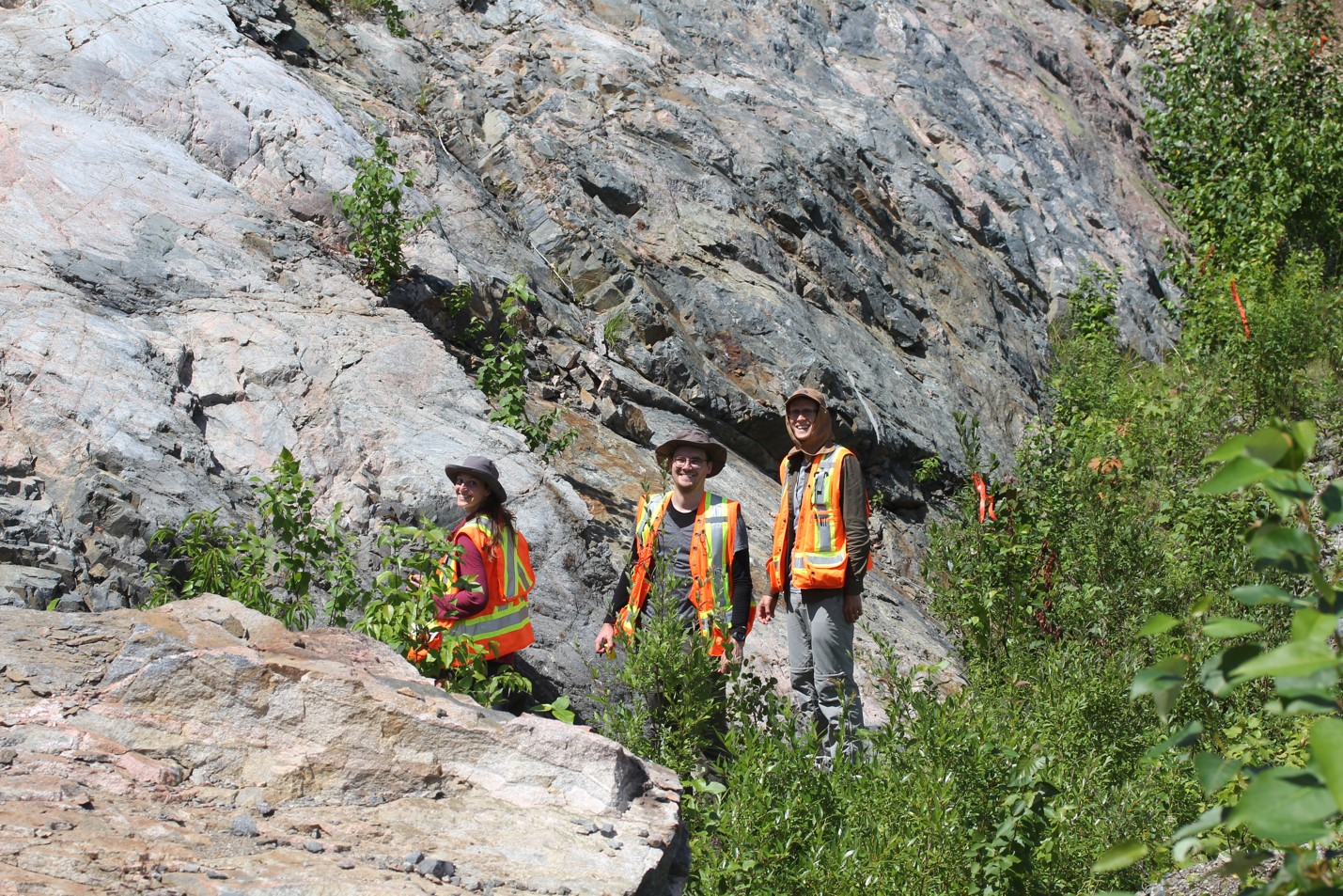 Sandra Baurier Aymat, Henning Seibel, and Dustin Peters in the field in Sudbury (photo by M Lesher)